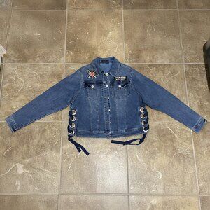 Women's blue denim jacket with VGK patches